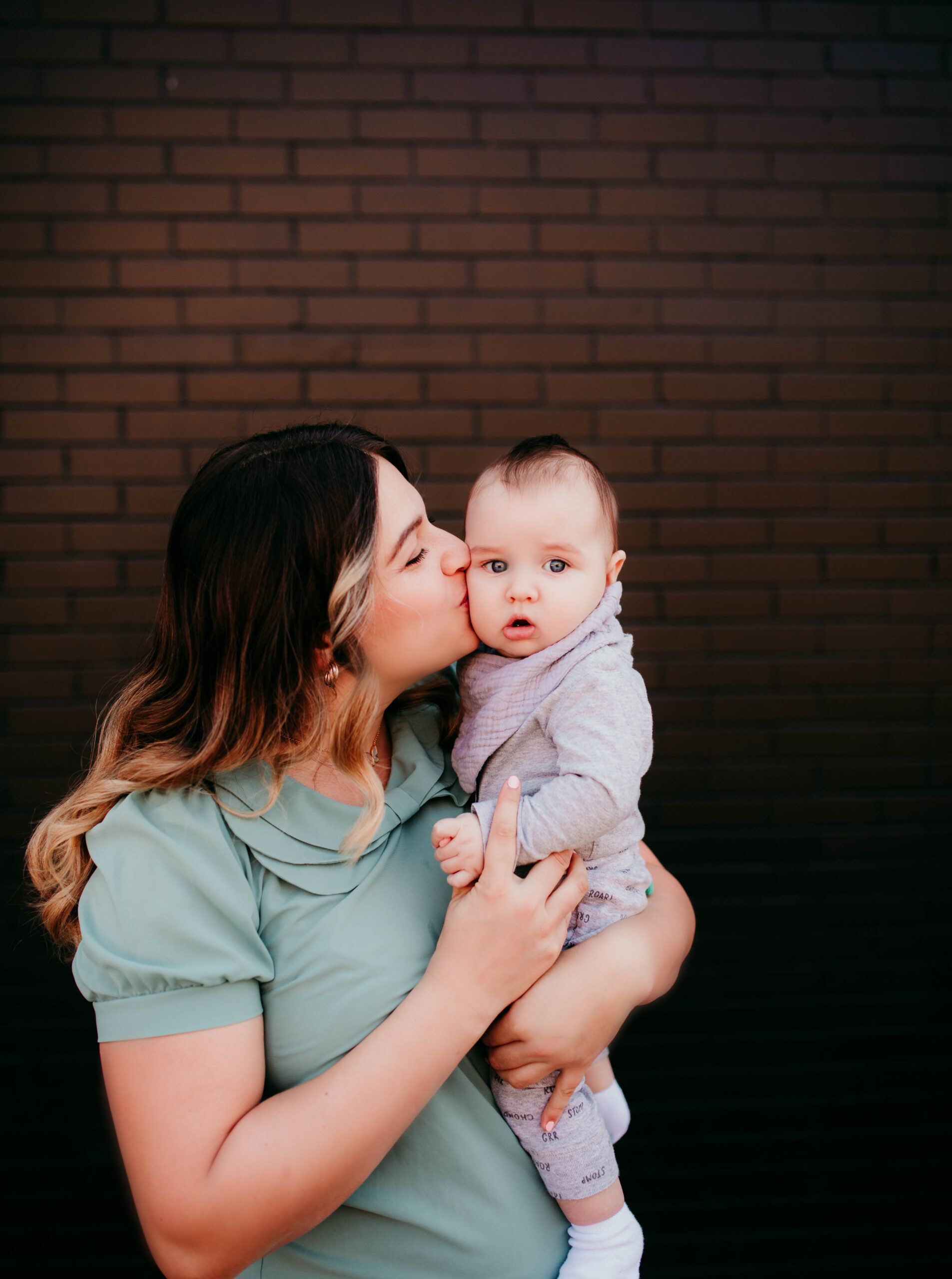 Bianca Hill, Fayetteville NC realtor and Army spouse, smiling with her young son, showing her life as a mom and military family advocate near Fort Bragg.
