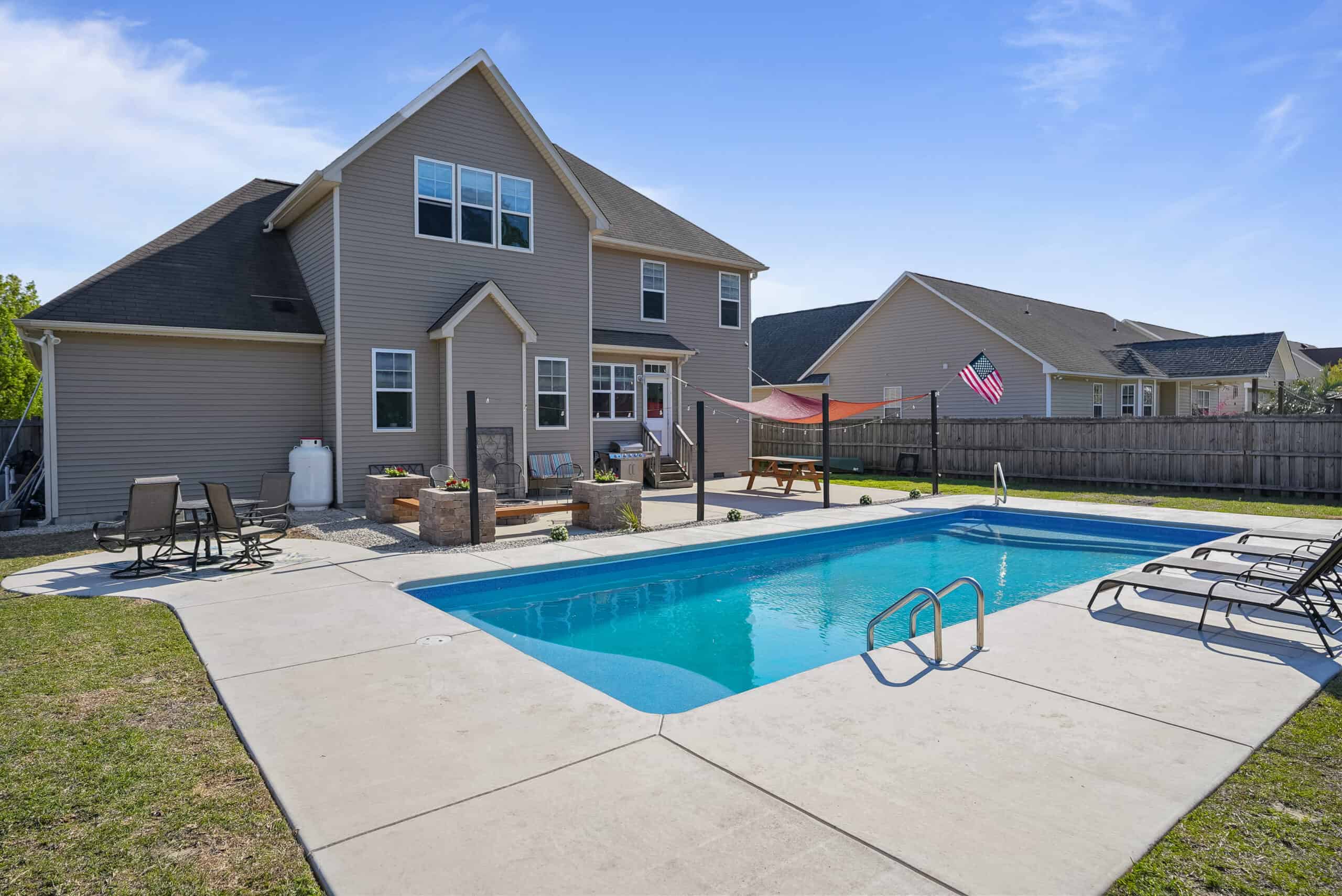 Backyard pool and outdoor living area of Hope Mills home near Fort Bragg NC listed by Bianca Hill REALTOR